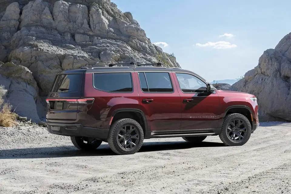 Grand Wagoneer – exterior profile on rugged terrain